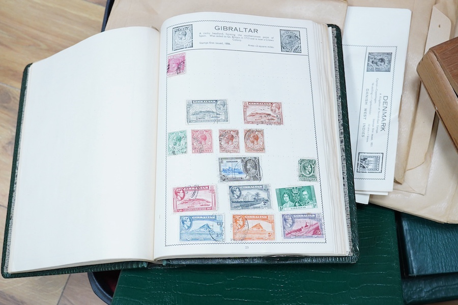 A large collection of world stamps, mounted and loose (in a suitcase and box). Condition - generally poor to fair